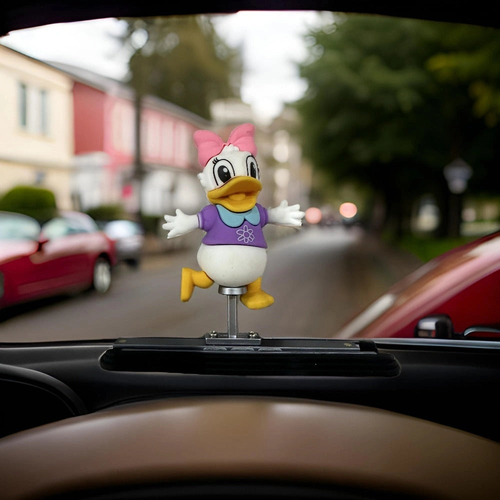 Daisy Duck Dancing Dashboard Sliding Doll-دمية ديزي داك الراقصة المنزلقة على لوحة القيادة-Auto-Emporio-Kuwait.0