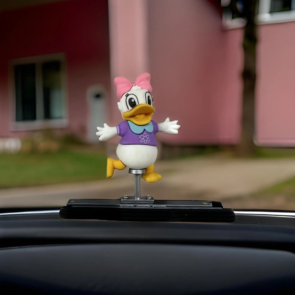 Daisy Duck Dancing Dashboard Sliding Doll-دمية ديزي داك الراقصة المنزلقة على لوحة القيادة-Auto-Emporio-Kuwait.0