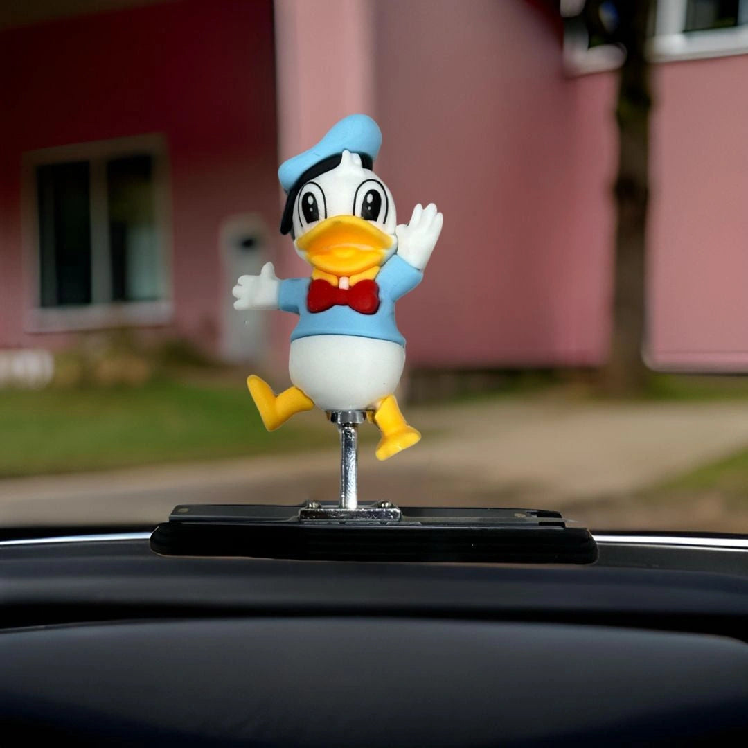 Donald Duck Dancing Dashboard Sliding Doll-دمية دونالد داك الراقصة المنزلقة على لوحة القيادة-Auto-Emporio-Kuwait.0