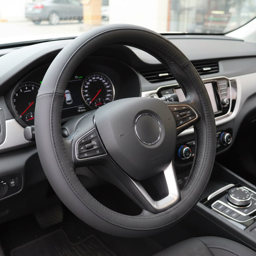 Grey PU leather steering wheel cover with anti-slip grip, universal fit car accessory in Kuwait
