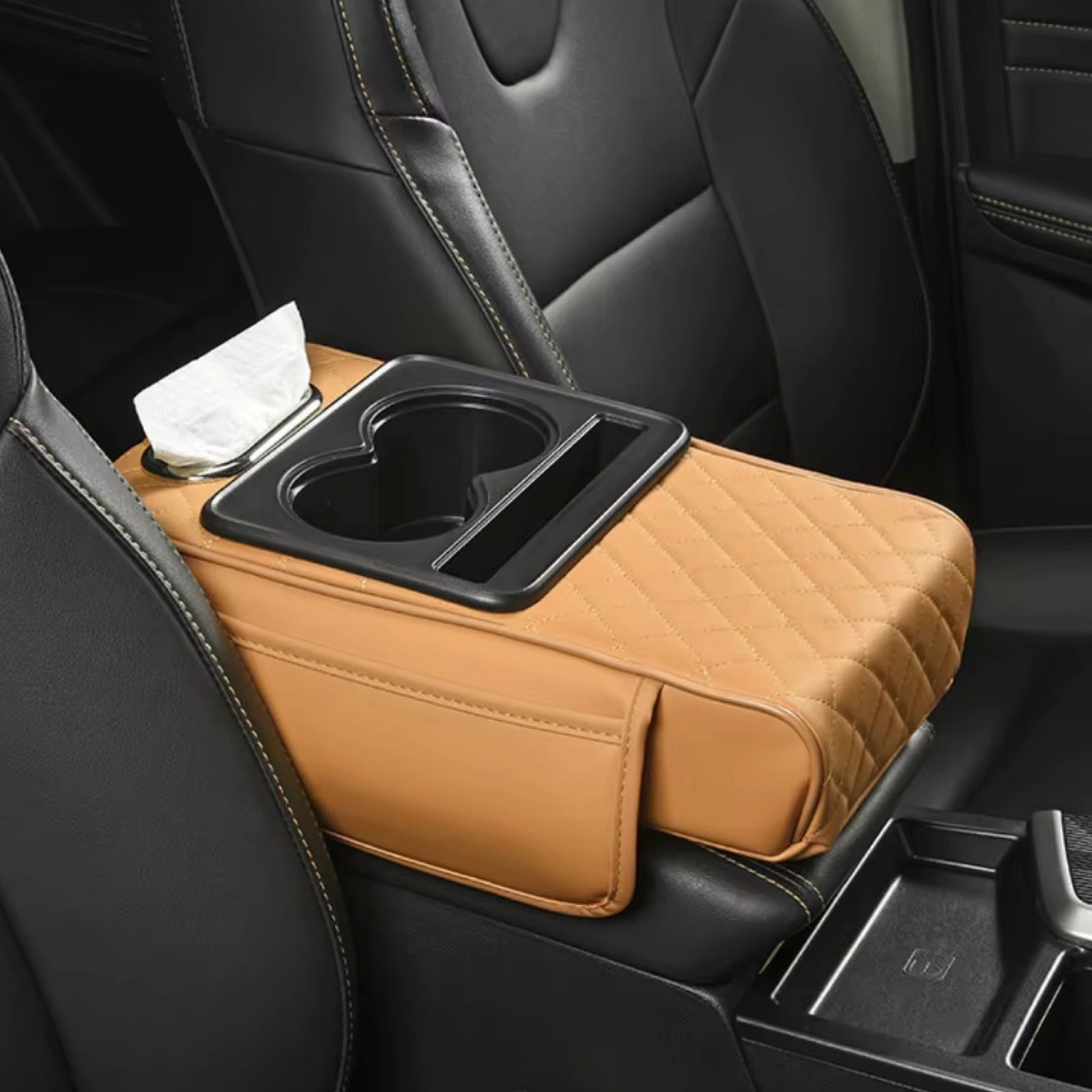 Car armrest organizer with cup holder and tissue holder in a vehicle in Kuwait.