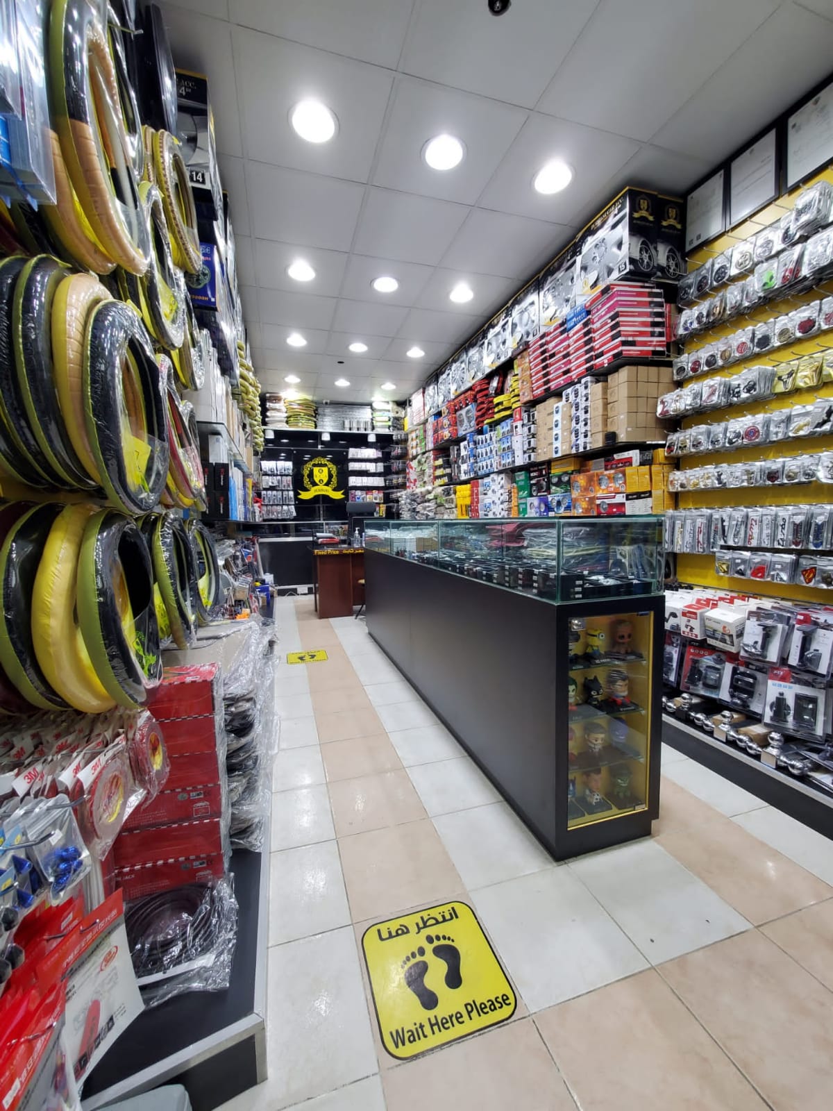 an image showing auto emporio by burhani car accessories shop from inside