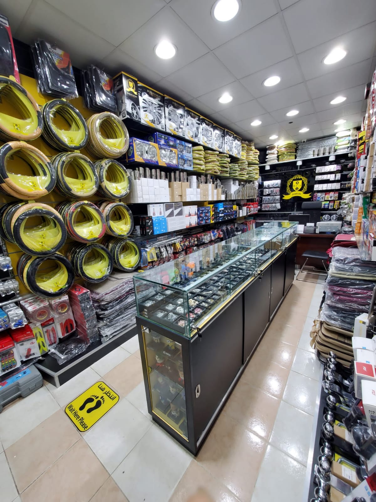 an image showing auto emporio by burhani car accessories shop from inside
